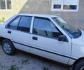 Белый Мицубиси Лансер, объемом двигателя 1.8 л и пробегом 200 тыс. км за 672 $, фото 1 на Automoto.ua