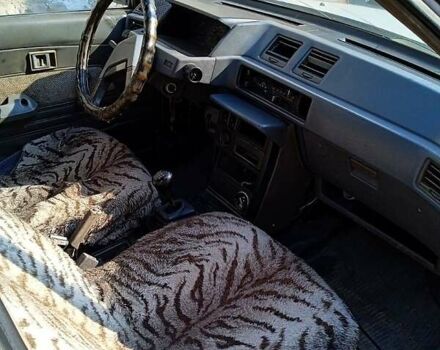 Мицубиси Лансер 1987 в Запорожье на Automoto.ua Белый Мицубиси Лансер, объемом двигателя 1.8 л и пробегом 270 тыс. км за 520 $, фото 5 на Automoto.ua