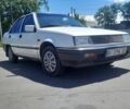 Білий Міцубісі Lancer, об'ємом двигуна 1.46 л та пробігом 292 тис. км за 1200 $, фото 1 на Automoto.ua