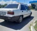 Білий Міцубісі Lancer, об'ємом двигуна 1.5 л та пробігом 292 тис. км за 1216 $, фото 1 на Automoto.ua