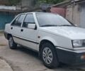 Белый Мицубиси Лансер, объемом двигателя 1.5 л и пробегом 250 тыс. км за 1300 $, фото 1 на Automoto.ua