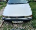 Білий Міцубісі Lancer, об'ємом двигуна 1.5 л та пробігом 100 тис. км за 25000 $, фото 1 на Automoto.ua
