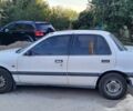 Белый Мицубиси Лансер, объемом двигателя 1.5 л и пробегом 300 тыс. км за 1600 $, фото 1 на Automoto.ua