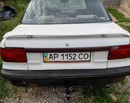 Білий Міцубісі Lancer, об'ємом двигуна 1.5 л та пробігом 100 тис. км за 605 $, фото 2 на Automoto.ua