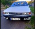 Білий Міцубісі Lancer, об'ємом двигуна 1.5 л та пробігом 250 тис. км за 1700 $, фото 1 на Automoto.ua