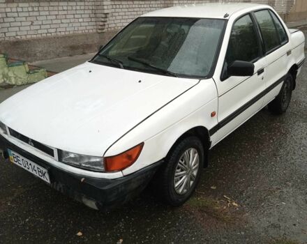 Білий Міцубісі Lancer, об'ємом двигуна 1.3 л та пробігом 345 тис. км за 750 $, фото 5 на Automoto.ua