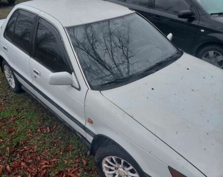 Белый Мицубиси Лансер, объемом двигателя 1.5 л и пробегом 400 тыс. км за 1300 $, фото 2 на Automoto.ua