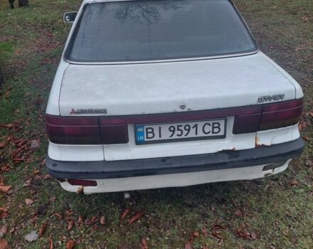 Белый Мицубиси Лансер, объемом двигателя 1.5 л и пробегом 400 тыс. км за 1300 $, фото 4 на Automoto.ua