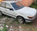 Белый Мицубиси Лансер, объемом двигателя 1.8 л и пробегом 300 тыс. км за 500 $, фото 1 на Automoto.ua