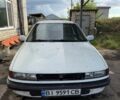 Білий Міцубісі Lancer, об'ємом двигуна 1.47 л та пробігом 100 тис. км за 1200 $, фото 1 на Automoto.ua