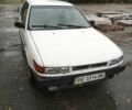 Білий Міцубісі Lancer, об'ємом двигуна 1.3 л та пробігом 345 тис. км за 750 $, фото 4 на Automoto.ua