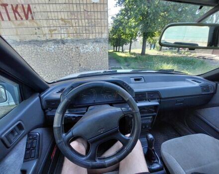 Белый Мицубиси Лансер, объемом двигателя 1.5 л и пробегом 400 тыс. км за 1300 $, фото 5 на Automoto.ua