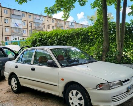 Білий Міцубісі Lancer, об'ємом двигуна 1.3 л та пробігом 280 тис. км за 2750 $, фото 6 на Automoto.ua