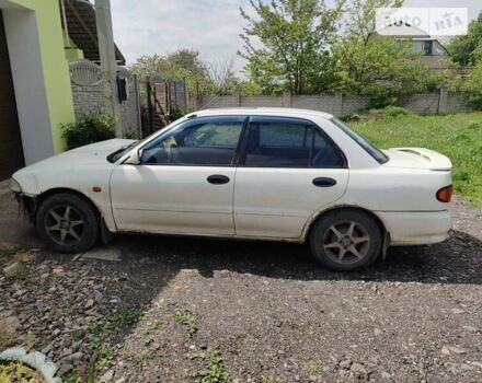 Білий Міцубісі Lancer, об'ємом двигуна 1.6 л та пробігом 485 тис. км за 1000 $, фото 1 на Automoto.ua