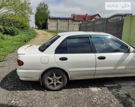 Білий Міцубісі Lancer, об'ємом двигуна 1.6 л та пробігом 485 тис. км за 1000 $, фото 3 на Automoto.ua