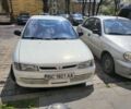 Белый Мицубиси Лансер, объемом двигателя 1.3 л и пробегом 350 тыс. км за 2500 $, фото 1 на Automoto.ua