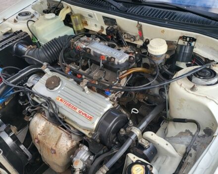 Білий Міцубісі Lancer, об'ємом двигуна 1.3 л та пробігом 280 тис. км за 2750 $, фото 5 на Automoto.ua