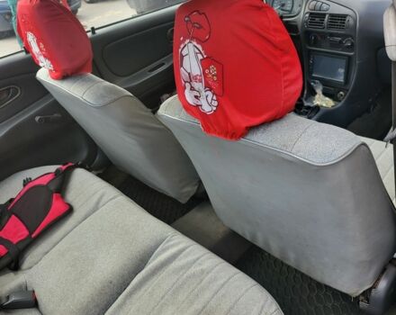 Білий Міцубісі Lancer, об'ємом двигуна 1.3 л та пробігом 280 тис. км за 2750 $, фото 4 на Automoto.ua