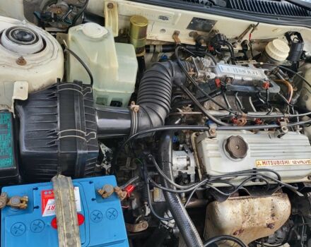 Білий Міцубісі Lancer, об'ємом двигуна 1.3 л та пробігом 280 тис. км за 2750 $, фото 3 на Automoto.ua