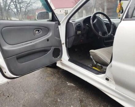 Білий Міцубісі Lancer, об'ємом двигуна 1.3 л та пробігом 300 тис. км за 1700 $, фото 9 на Automoto.ua