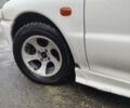 Білий Міцубісі Lancer, об'ємом двигуна 1.3 л та пробігом 300 тис. км за 1700 $, фото 12 на Automoto.ua