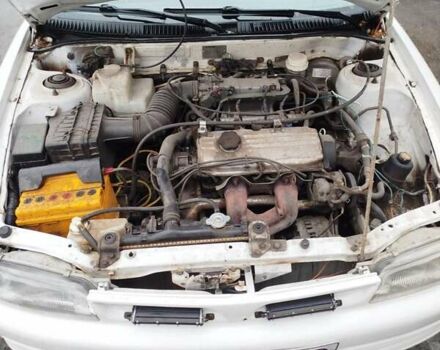 Білий Міцубісі Lancer, об'ємом двигуна 1.3 л та пробігом 300 тис. км за 1700 $, фото 8 на Automoto.ua