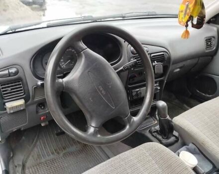 Білий Міцубісі Lancer, об'ємом двигуна 1.3 л та пробігом 300 тис. км за 1700 $, фото 6 на Automoto.ua