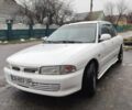Білий Міцубісі Lancer, об'ємом двигуна 1.3 л та пробігом 300 тис. км за 1700 $, фото 1 на Automoto.ua