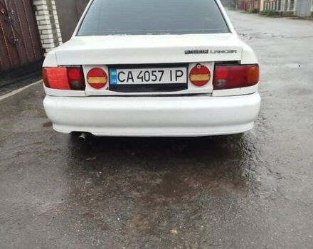 Білий Міцубісі Lancer, об'ємом двигуна 1.3 л та пробігом 300 тис. км за 1700 $, фото 5 на Automoto.ua