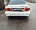 Білий Міцубісі Lancer, об'ємом двигуна 1.3 л та пробігом 300 тис. км за 1700 $, фото 5 на Automoto.ua