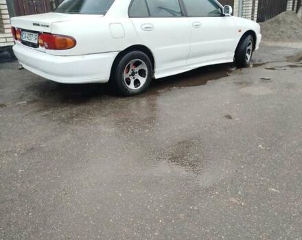 Білий Міцубісі Lancer, об'ємом двигуна 1.3 л та пробігом 300 тис. км за 1700 $, фото 2 на Automoto.ua