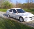 Білий Міцубісі Lancer, об'ємом двигуна 1.3 л та пробігом 333 тис. км за 1450 $, фото 5 на Automoto.ua