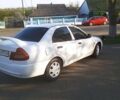Білий Міцубісі Lancer, об'ємом двигуна 1.3 л та пробігом 333 тис. км за 1450 $, фото 7 на Automoto.ua