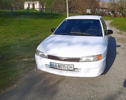 Белый Мицубиси Лансер, объемом двигателя 1.3 л и пробегом 287 тыс. км за 1550 $, фото 6 на Automoto.ua