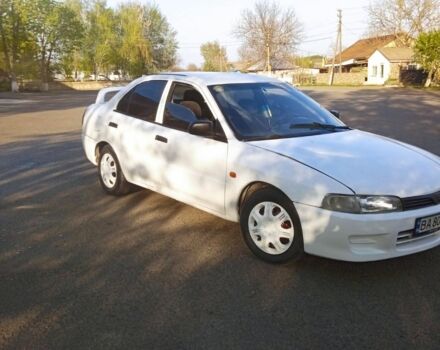 Белый Мицубиси Лансер, объемом двигателя 1.3 л и пробегом 287 тыс. км за 1550 $, фото 8 на Automoto.ua