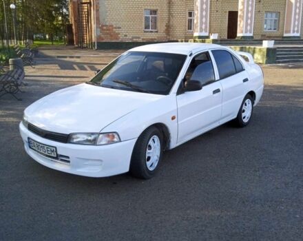 Белый Мицубиси Лансер, объемом двигателя 1.3 л и пробегом 287 тыс. км за 1550 $, фото 5 на Automoto.ua