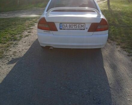 Белый Мицубиси Лансер, объемом двигателя 1.3 л и пробегом 287 тыс. км за 1550 $, фото 3 на Automoto.ua