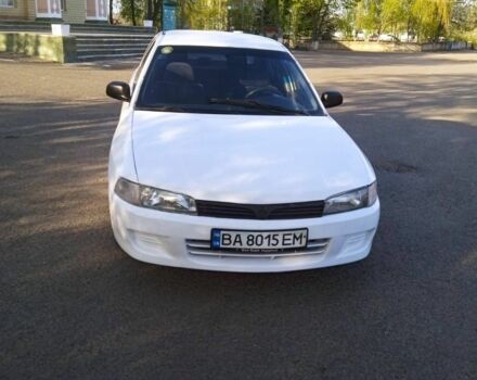 Белый Мицубиси Лансер, объемом двигателя 1.3 л и пробегом 287 тыс. км за 1550 $, фото 4 на Automoto.ua