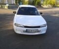 Білий Міцубісі Lancer, об'ємом двигуна 1.3 л та пробігом 333 тис. км за 1450 $, фото 11 на Automoto.ua