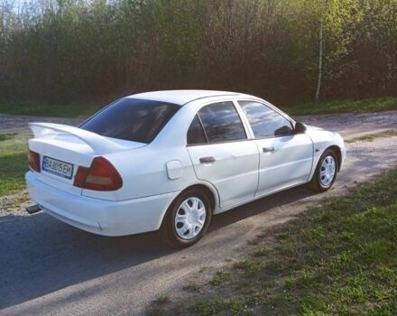 Белый Мицубиси Лансер, объемом двигателя 1.3 л и пробегом 287 тыс. км за 1550 $, фото 11 на Automoto.ua