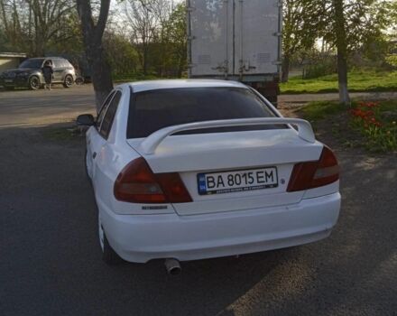 Белый Мицубиси Лансер, объемом двигателя 1.3 л и пробегом 287 тыс. км за 1550 $, фото 9 на Automoto.ua