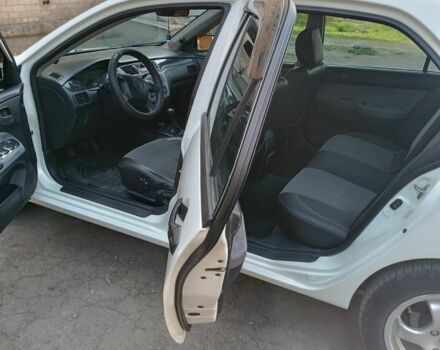 Білий Міцубісі Lancer, об'ємом двигуна 1.6 л та пробігом 198 тис. км за 4463 $, фото 12 на Automoto.ua