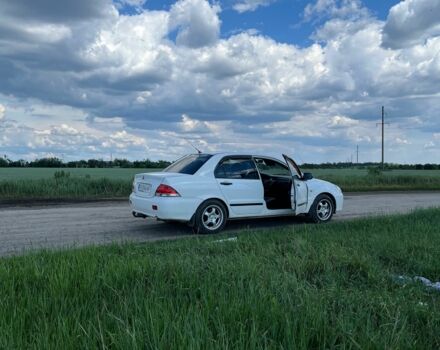 Білий Міцубісі Lancer, об'ємом двигуна 1.6 л та пробігом 198 тис. км за 4463 $, фото 2 на Automoto.ua