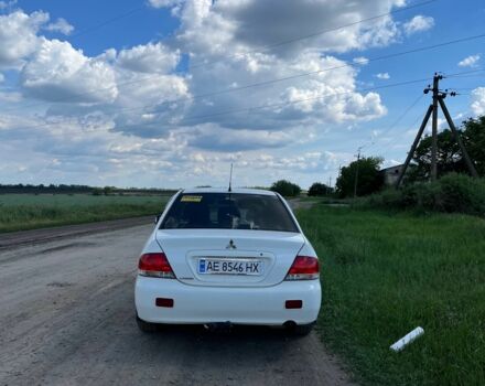 Білий Міцубісі Lancer, об'ємом двигуна 1.6 л та пробігом 198 тис. км за 4463 $, фото 3 на Automoto.ua