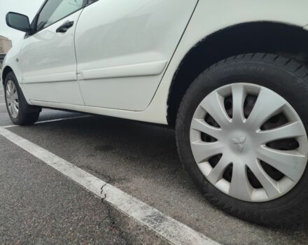 Белый Мицубиси Лансер, объемом двигателя 1.6 л и пробегом 306 тыс. км за 3000 $, фото 7 на Automoto.ua