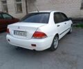 Білий Міцубісі Lancer, об'ємом двигуна 1.6 л та пробігом 198 тис. км за 4463 $, фото 8 на Automoto.ua