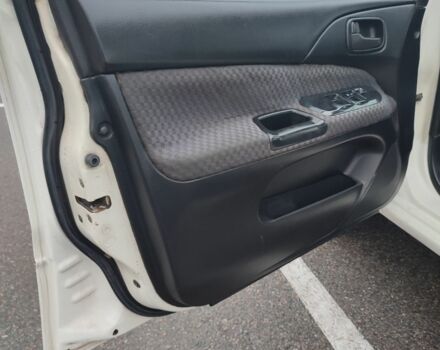 Белый Мицубиси Лансер, объемом двигателя 1.6 л и пробегом 306 тыс. км за 3000 $, фото 11 на Automoto.ua