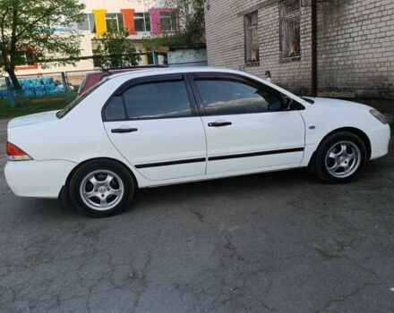 Білий Міцубісі Lancer, об'ємом двигуна 1.6 л та пробігом 198 тис. км за 4463 $, фото 10 на Automoto.ua