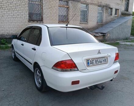 Білий Міцубісі Lancer, об'ємом двигуна 1.6 л та пробігом 198 тис. км за 4463 $, фото 9 на Automoto.ua