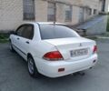 Білий Міцубісі Lancer, об'ємом двигуна 1.6 л та пробігом 198 тис. км за 4463 $, фото 9 на Automoto.ua